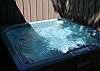 Enjoy a relaxing soak in this nice size hot tub.