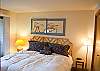 Ease your stress away in this downstairs King Bedroom with the hot tub right outside your door!