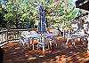 Outdoor BBQ and plenty of seating for the entire group.