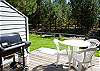 Nice little back patio and lawn area.