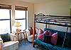 The second bedroom downstairs contains a set of Bunk Beds.  This one is a special set-up with a Futon Bed on the Bottom and a Twin Size Bed on Top.