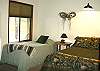 This bedroom features a Full Size Bed as well as a Twin.  Bedroom is right next door to the hall bathroom.