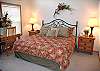 The King Master Bedroom upstairs has a TV with a DVD/VHS player.  The master bath has a shower.