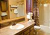 This bathroom has a tub and shower.