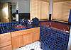 This home has 4.5 bathrooms.  This full bathroom is located in the den downstairs.
Right next door is the sauna!