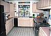 The cook can be in on the fun too. Nice big kitchen with lots of room to move around. For all those helpers, there is a bar for you to sit at to watch the famous cook in the kitchen.