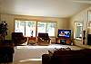 Large flat screen TV is perfect for watching your favorite sports event or a good movie with the family.