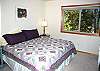 King Bedroom Upstairs shares hall bath and bedroom has a small TV/VHS.