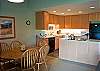 Great open kitchen with plenty of lighting for preparing delicious meals.  Seating for 6