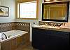 You will enjoy this spacious Master Bath with an extra large Jetted Tub.