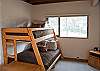 Pyramid bunks in open loft. Double on the bottom and single up top.