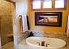 Large walk in shower and whirlpool tub in the master bath upstairs.