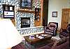 Join family and friends together in this spacious great room to enjoy a warm crackling fire.