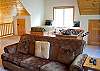Let the kids have their own space in this huge upstairs loft area with a TV, DVD, Queen Sofa Sleeper, two twin beds, and a foos ball table.