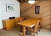 Dining room table seats 4 people.