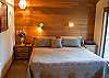 Upstairs Master King Bedroom has small deck, a corner wood stove, TV/VHS and Master Bath has a shower.