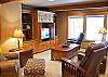 Family room downstairs with large flat screen TV.