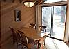 Dining area will seat 4 comfortably. The slider lets lots of light in and gives you easy access to the back porch.