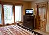 King master bedroom downstairs with it's own flat screen TV.
