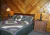 Queen size bed in a King size bedroom. Main floor