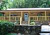 In the gentle breeze of the mountains is what you will find in this home.