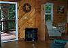 Gas fireplace in the sitting area and private porch overlooking your own fishing pond