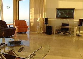 Living Area with Plasma T.V.