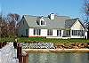 Private and spacious waterfront retreat with dock, sandy beach