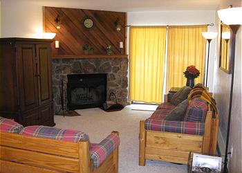 Breckenridge Condominium rental - Interior Photo - Living Room with Wood Burning Fireplace