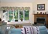 The bay windows, matched with this being an end unit, makes for some great natural views of the woods surrounding the property and the fireplace'll keep the heart warm in any season.