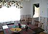 View #2 of the Bear Moose Crossing Dining Room.