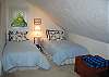 Two twin beds and a slightly slanted ceiling can be expected out of this 3rd bedroom.  Cozy, cute yet not too large.  The kids'll love it.