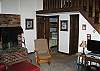 The living area of the Tram View Chalet includes a working fireplace with wood provided.  Cable TV and internet too.