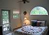 This bedroom enjoys the benfits of an attached bath, queen size bed AND it's very own 'Crow's Nest' type deck.   The ceiling fans you cool in summer and assists in keeping the warmth down in winter.