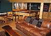 Entering the from the living area upstairs, the grand game room of the Timber Ridge Retreat with all it's special extras awaits you and your families enjoyment.  They even have a card-puzzle table as seen on the left side of the photo above.  Kick back and enjoy!!