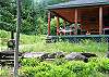 Whether you are resting in the Hamock or sitting up on any one of your choice of chairs on the petty coat style deck, great views down to the lake are sure to be enjoyed.  All of NH's White Mountains will be just beyond.