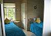 The second bedroom in "IDRA" offers 2 twin beds, nicely off-set and staggered to enable a peaceful night's sleep be had by all.