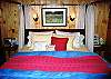 The Grand Master Suite of the professionally managed Timber Ridge Retreat includes a California King size Four Post bedroom set, that connects to a wonderful powder room.  The bathroom is just soo cute.