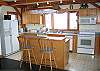 As you can clearly see here, the kitchen in the Round Mountain Lodge is very well and naturally lit.  What's not so apparent here is how well situated and equipped this kitchen really is.  Just perfect for crafting the meals for your larger groups dining needs.