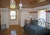 Located just up the stairs from the main floor and outside the door of the master bedroom this sleeping area also has a daybed with twin trundle configuartion.  More White Mountain Vacation Rental comfort.