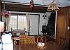 In this shot you get a glance of the raised fireplace that is well known for raising the warmth of many hearts-n-souls of prior guests of the chalet.  You can watch television and the fire at the same time.