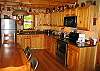 "Izzy's" Pearl Lake Log Home features a  small yet very well equipped kitchen and there is a top-quality gas BBQ Grill just outside on the deck too.  Great meals come easy at "Izzy's Place".