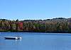 This is the view as seen from Narnia's decks and dock during New Hampshire's  Autumn fall foliage months of September & October.  We call this the quieter side of summer on the Forest Lake.