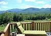The grand views from the professionally managed Timber Ridge Retreat log home are magnificent even during the dullest of Franconia's four seasons.  The rolling 4000' plus White Mountain peaks are nearly never ending as seen from the wrap-around porch of the Timber Ridge Retreat.