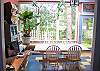 We said the litchen was loaded with light, in part because it opens to this wonderful Solarium type room.  Real Banana trees in Franconia, who would imagine such a thing.