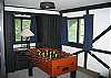 Looking for a little distraction from the outside pursuits of White Mountain fun?  Not to worry while staying at the #3 Woodchuck Trail Chalet.  The family game room and entertainment area affords lots of inside entertainment for your "days off".