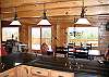 Even the kitchen includes great views to the exterior, however the interiors of the grand Timber Ridge Retreat will do well to compete for your interest.