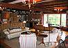 The home is bascially split into two sides by the Massive fireplace and chimney that splits is the middle.  This would be the Kitchen, Dining and sitting area side, fireplace and woodstove included.