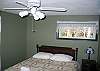 Offers it's guests a Queen size bed, the second bedroom in the Franconia Slalom Chalet is a bit smaller than the first yet just as comfy.  Television with cable service included... yet just out of this picture.