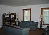 Proof of the 3rd couch previously mentioned can been seen on the right inside corner of this photo.  It's leather and large.